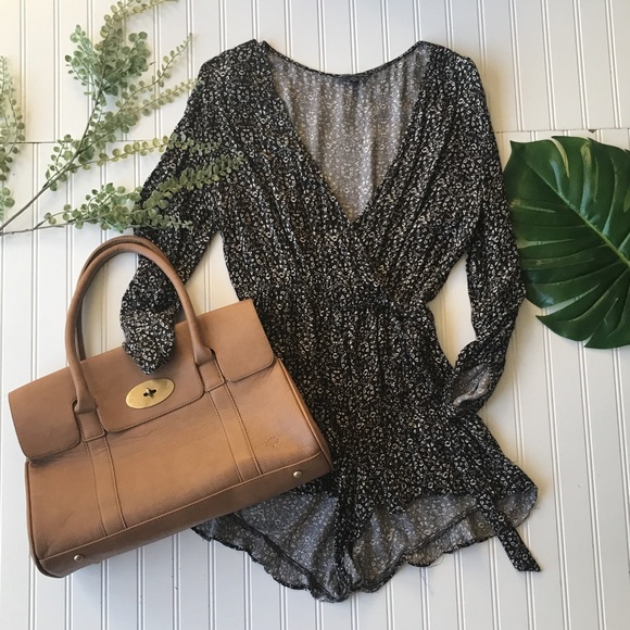 American Eagle Outfitters Pants - American Eagle romper floral black while sleeved